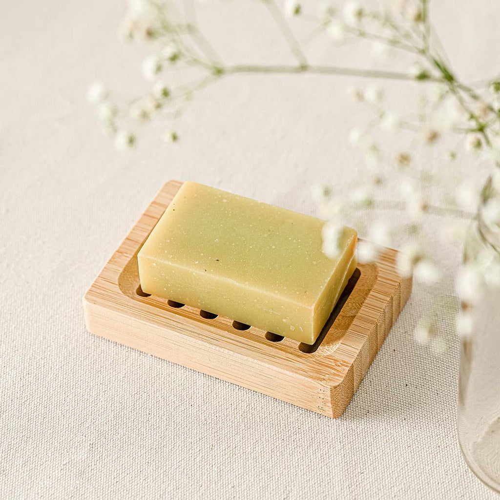 Natural wooden soap dish with horizontal drainage slots and non slip base for bathroom sinks — view 2