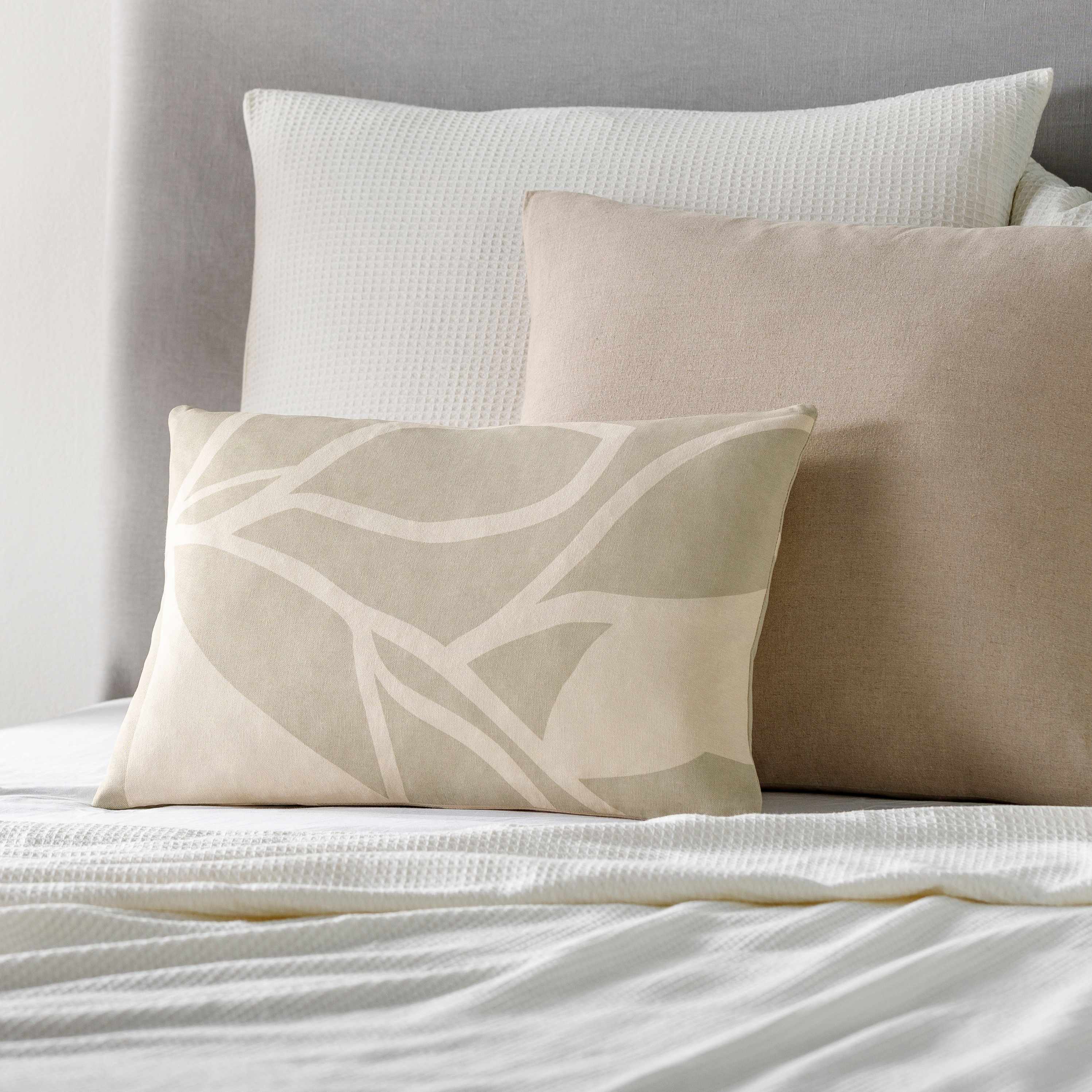 Contemporary woven throw pillow in tan and beige natural cotton for modern living room decor. — view 5