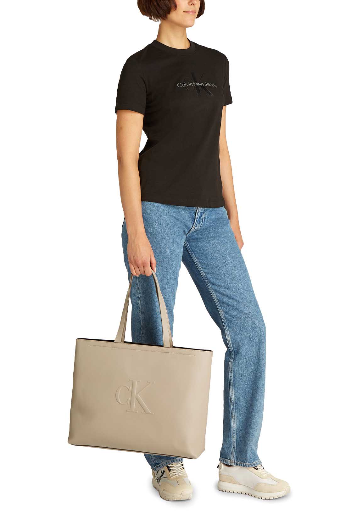 Womens black faux-leather tote bag with double handles and embossed monogram front detailing — view 4