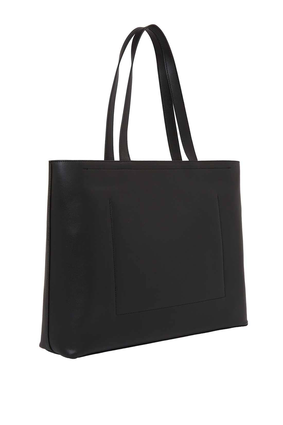 Womens black faux-leather tote bag with double handles and embossed monogram front detailing — view 13