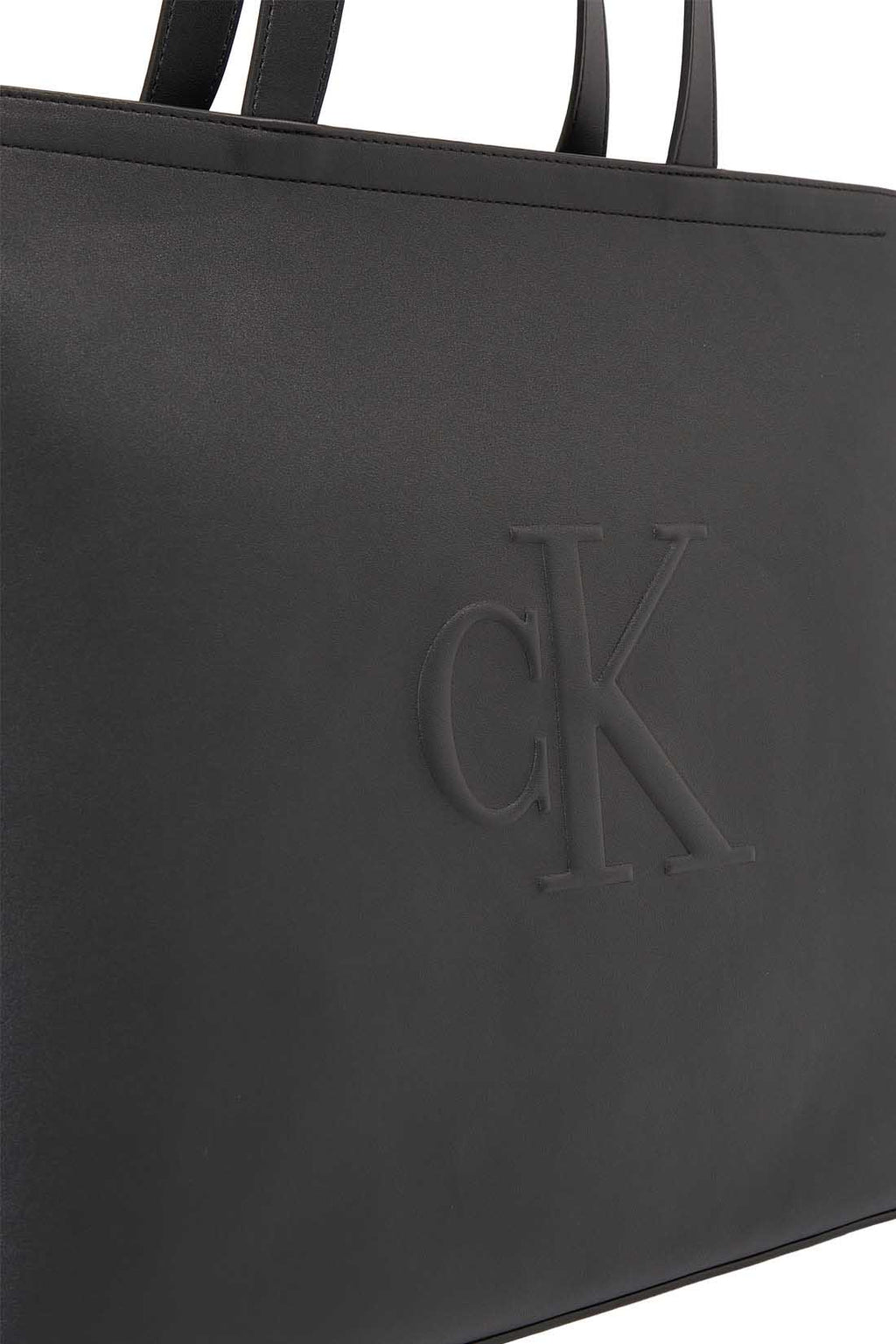 Womens black faux-leather tote bag with double handles and embossed monogram front detailing — view 12