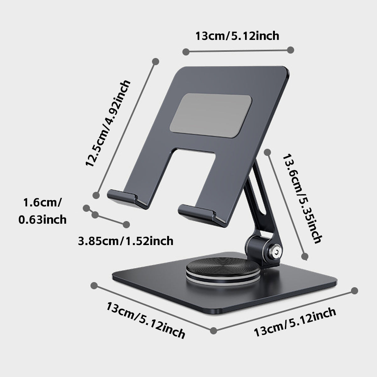 Silver carbon steel foldable tablet stand holding a device on a desk with a non-slip base — view 3