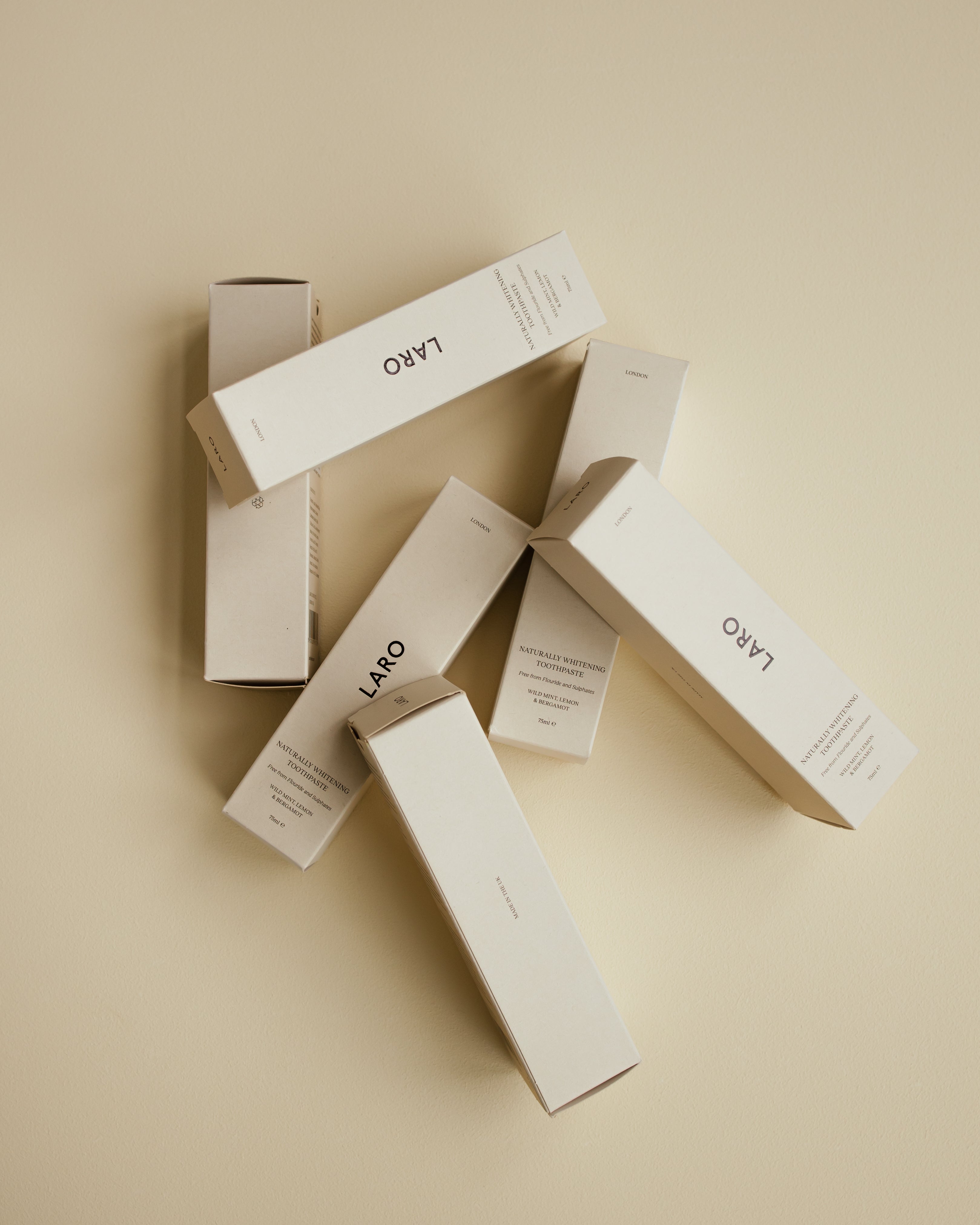 Naturally whitening toothpaste in a fully recyclable aluminum tube with natural mint and lemon flavor. — view 5