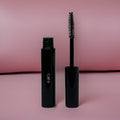 Vegan lash rejuvenator serum bottle with mascara wand applicator, enriched with natural hemp oil.