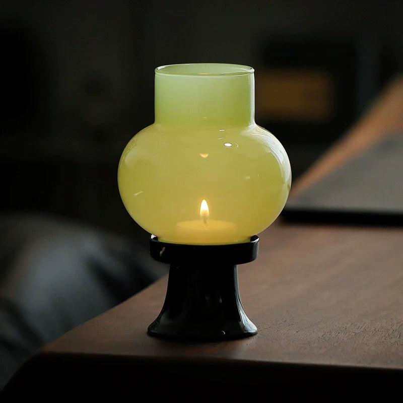 Hand-blown heat-resistant glass aroma candle lamp with a sleek black ceramic base — view 5