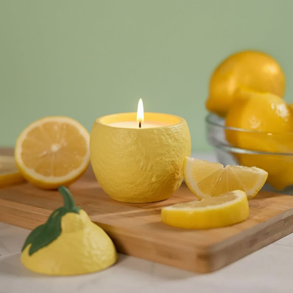 Lemon shaped silicone candle jar mold with lid, showing textured peel and leaf details. — view 3