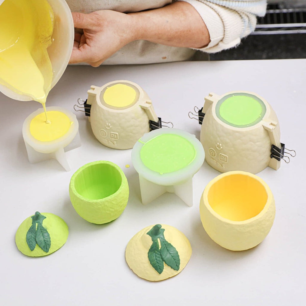 Lemon shaped silicone candle jar mold with lid, showing textured peel and leaf details. — view 5