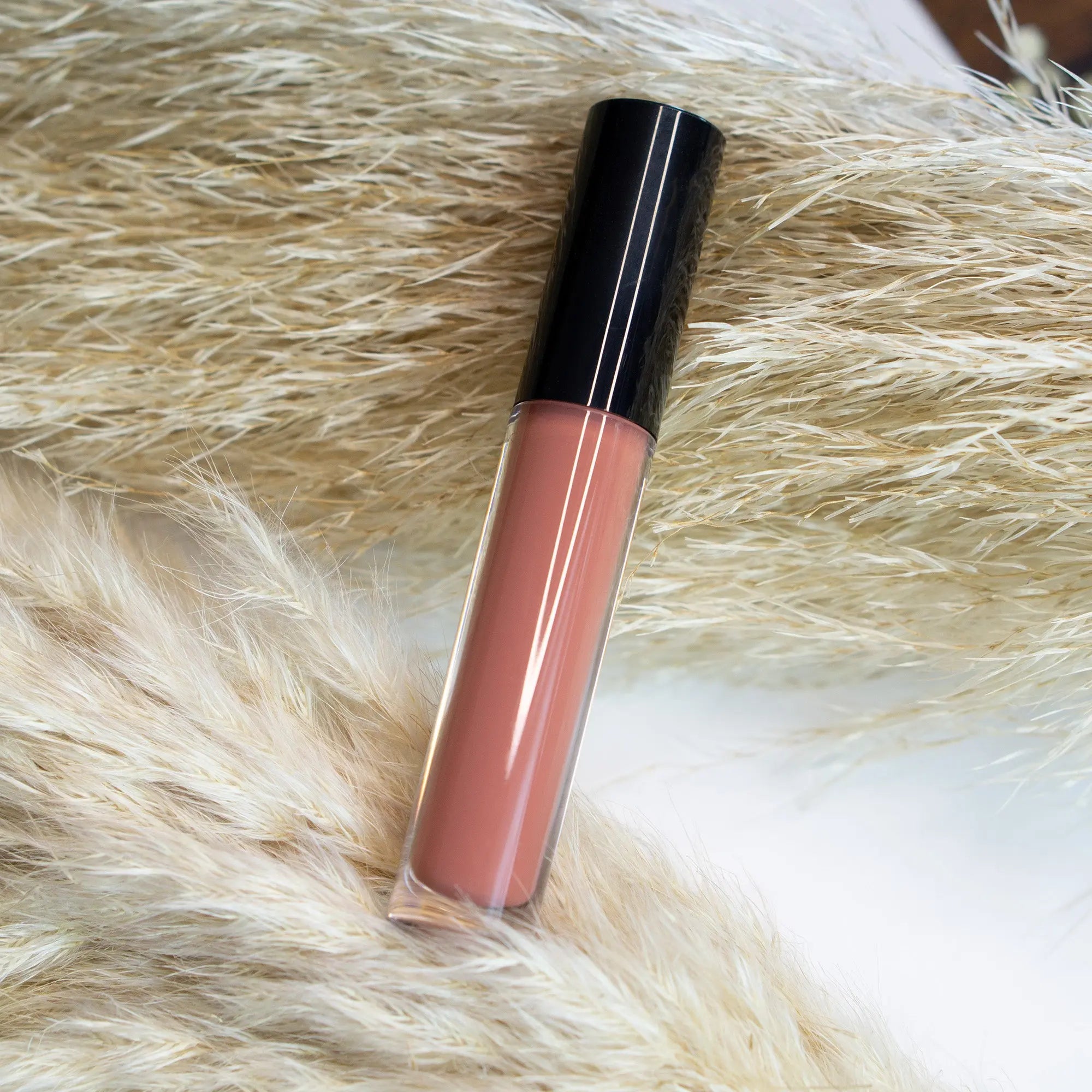 Liquid rouge lip gloss tube with doe-shaped applicator showcasing high shine shimmer and vibrant tint — view 4