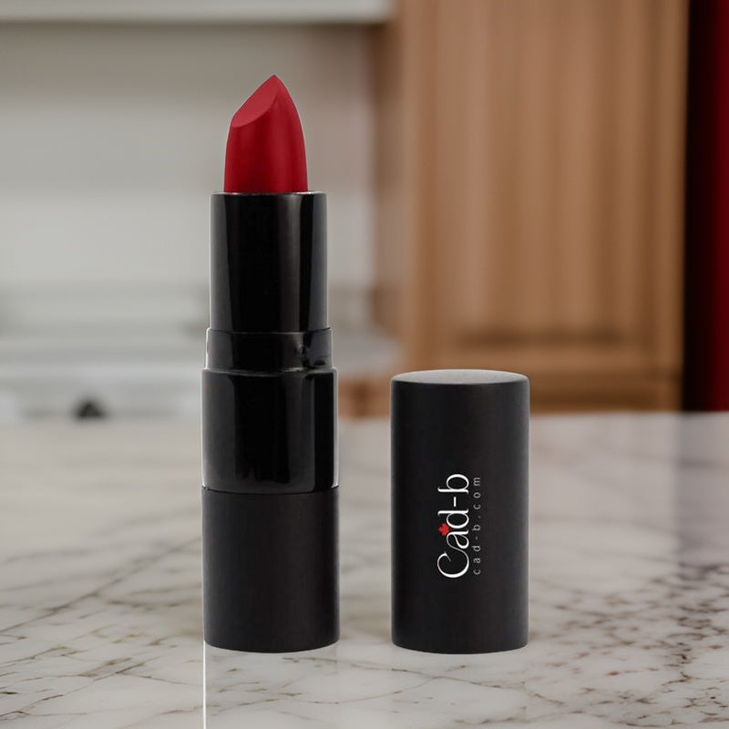 Creamy hydrating lipstick tube in shade Thrill P016 showing rich vibrant color and elegant packaging