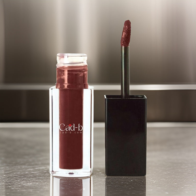 Cherry wine liquid cream lipstick in recyclable tube packaging showcasing a flawless velvety matte finish.