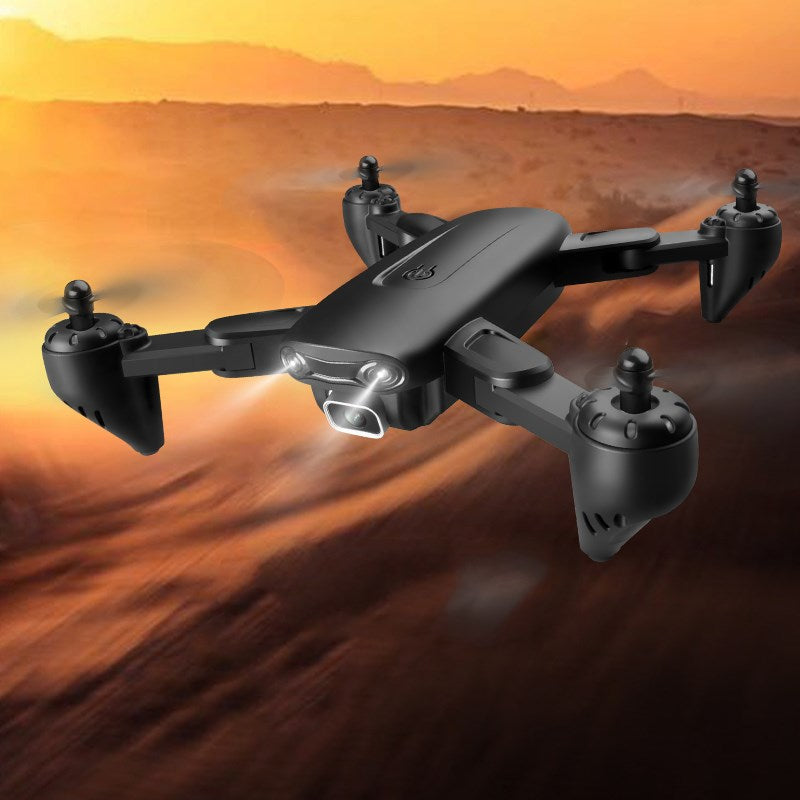 Foldable RC aircraft drone equipped with a 4K camera and remote control handle. — view 3