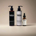 Lustrao hair growth trio set featuring shampoo, conditioner, and oil bottles with botanical ingredients.