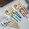 Luxury 304 stainless steel cutlery set with gold mirror finish and elegant green enamel handles