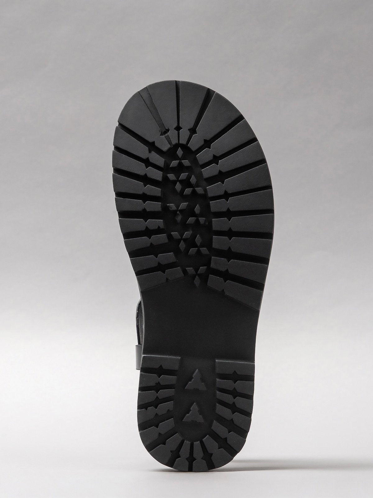 Pair of black women's sandals featuring minimalist synthetic straps and a comfortable flat walking sole — view 5