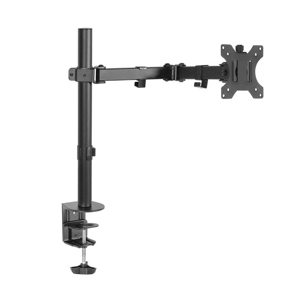 Black steel single monitor arm mount attached to a desk, holding a flat screen display