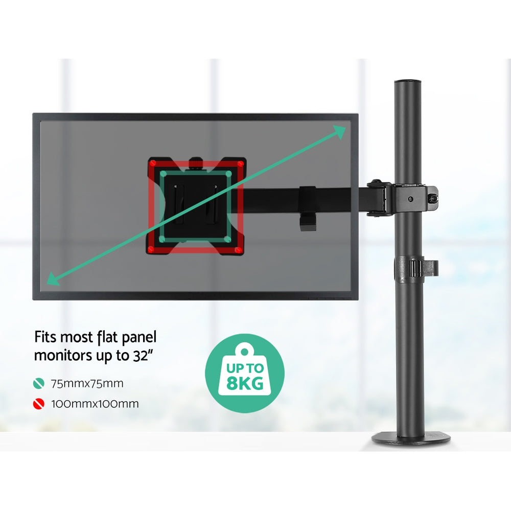 Black steel single monitor arm mount attached to a desk, holding a flat screen display — view 4