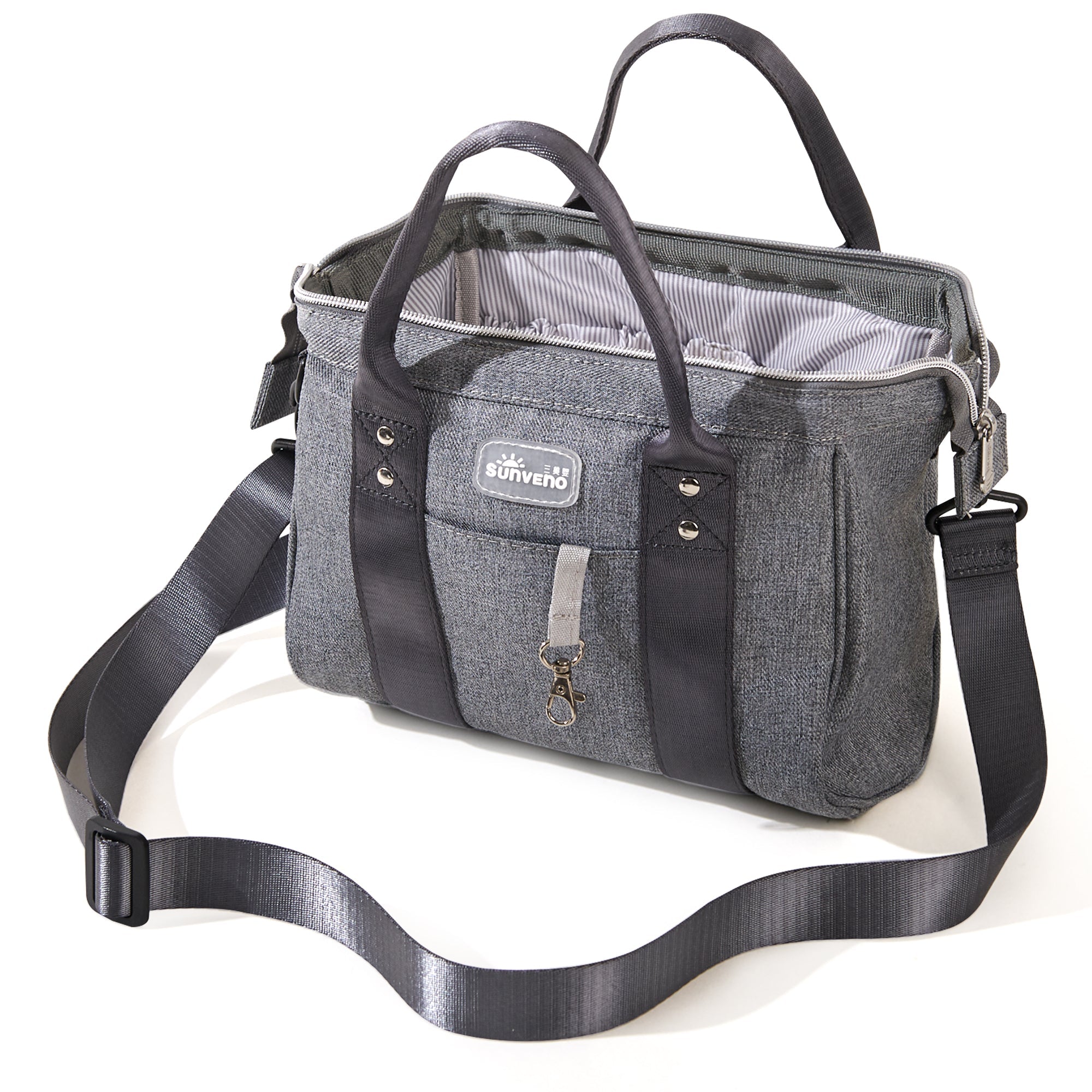 Small crossbody diaper bag in durable polyester with front pocket and bottle holders for modern parents