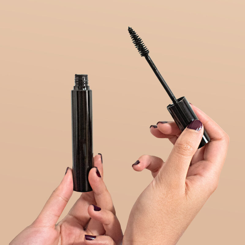 Black lengthening mascara tube and applicator brush with creamy smudge-proof vegan makeup formula — view 7