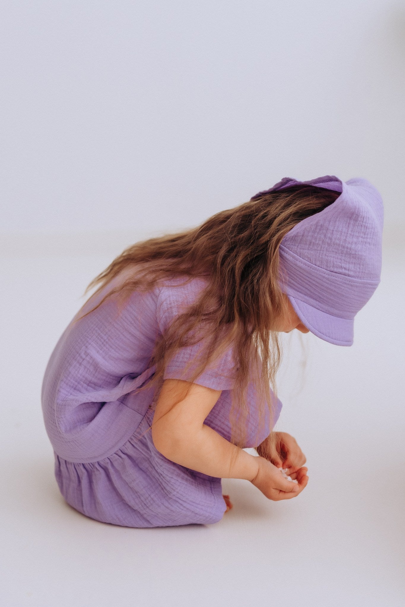 Minni girls dress with short sleeves and ruffled hem in lightweight cotton muslin fabric — view 5