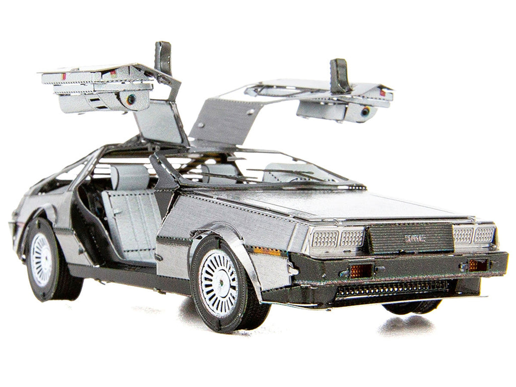 DeLorean metal model kit fully assembled showing brushed stainless steel finish and opening gull-wing doors — view 3