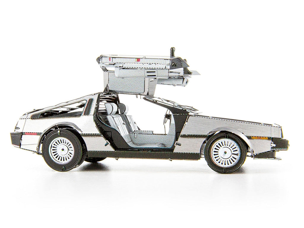 DeLorean metal model kit fully assembled showing brushed stainless steel finish and opening gull-wing doors