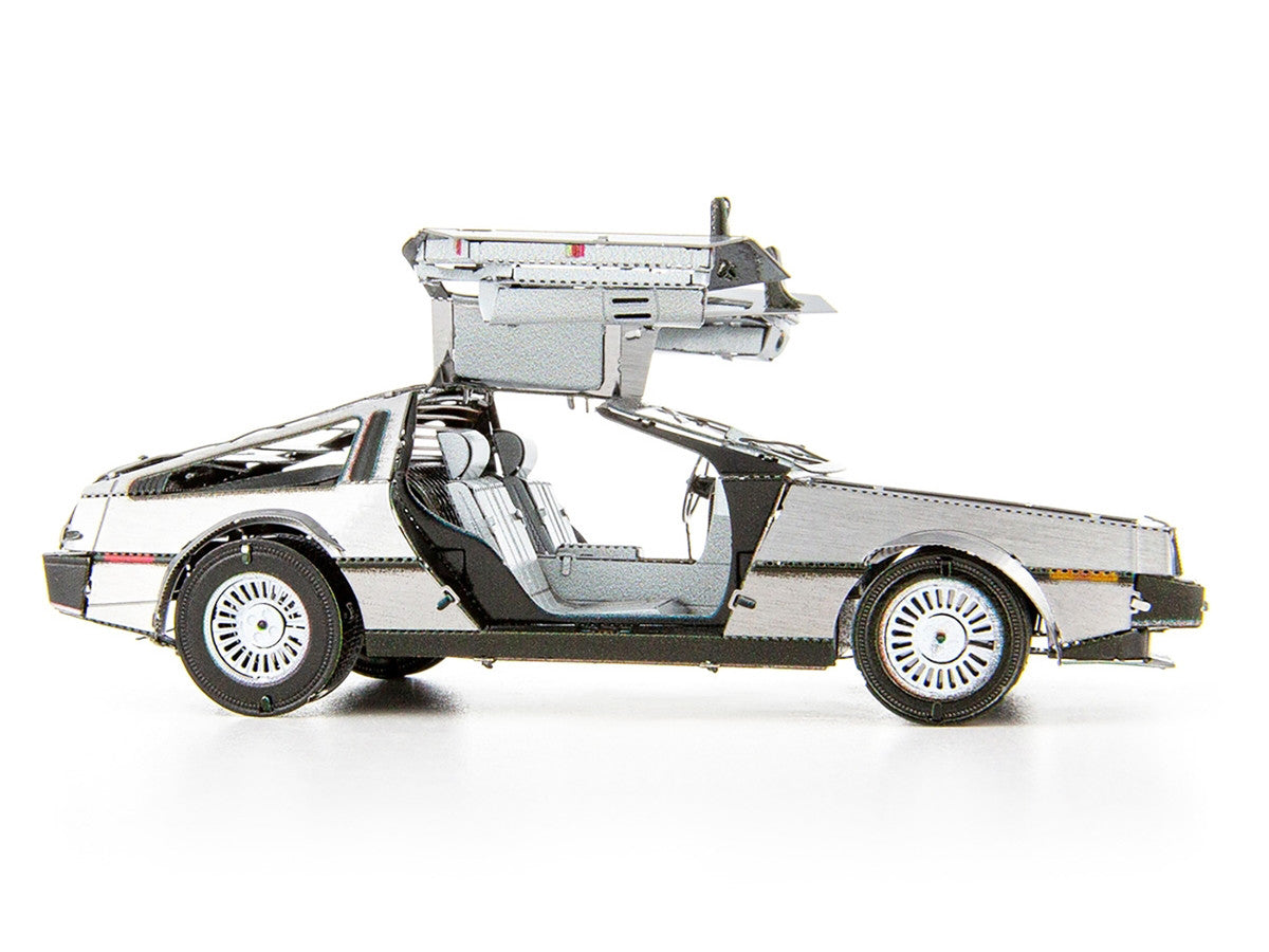 DeLorean metal model kit fully assembled showing brushed stainless steel finish and opening gull-wing doors