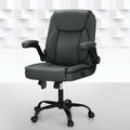 Grey massage office chair in PU leather with padded armrests and five-wheel swivel metal base