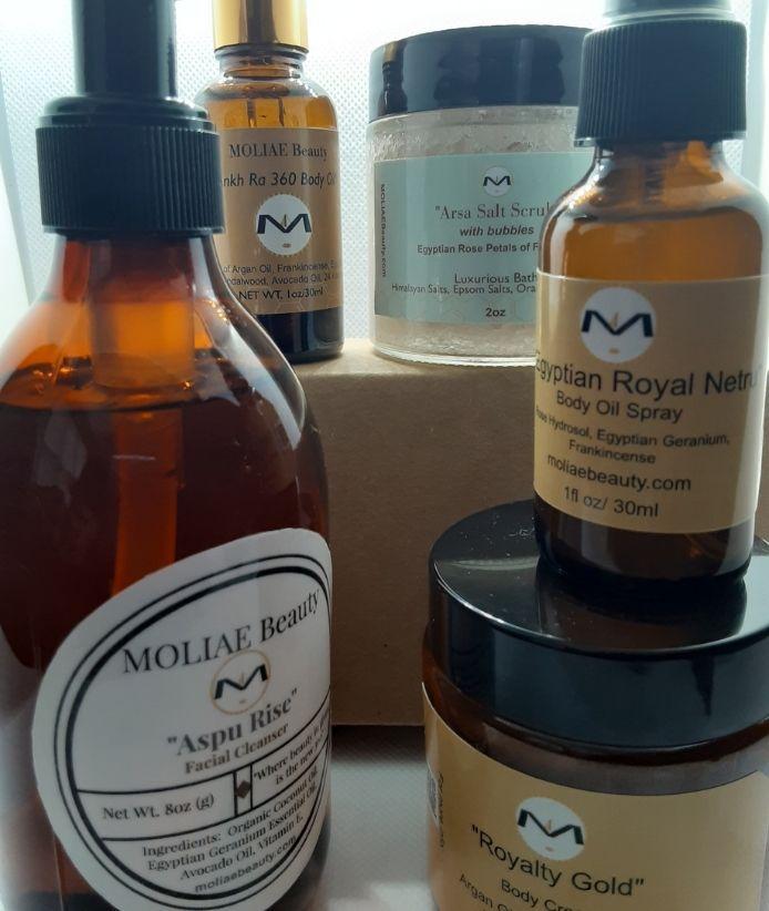 MOLIAE Gold Aspu organic spa skincare self care set featuring body oil, face cleanser and scrub
