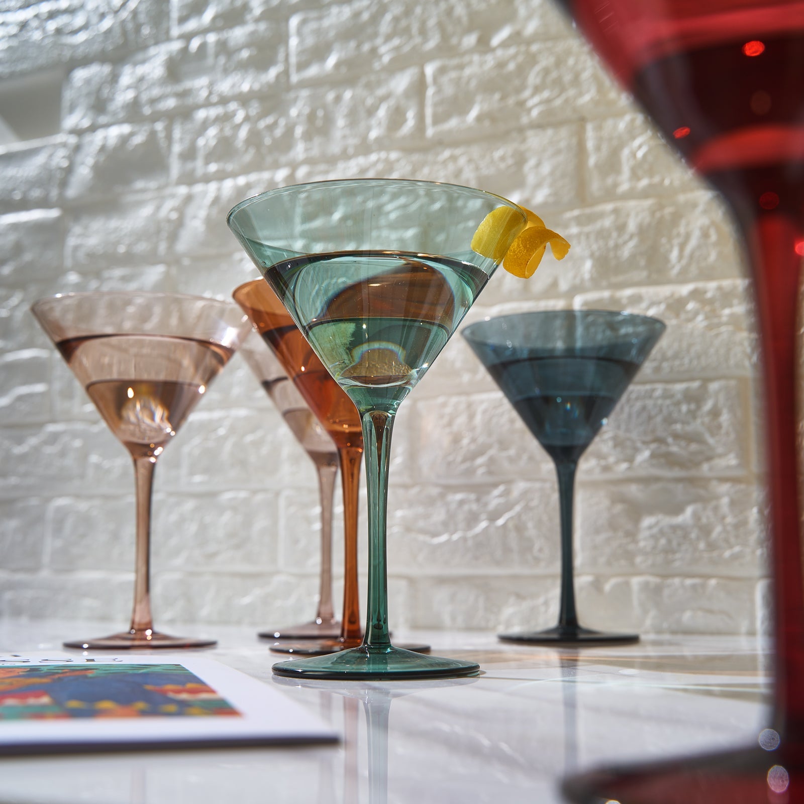 Set of six pastel colored crystal martini glasses in muted tones for elegant home bar entertaining — view 3