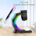 4-in-1 magnetic wireless charging station powering a smartphone, smartwatch, and earbuds with ambient light.