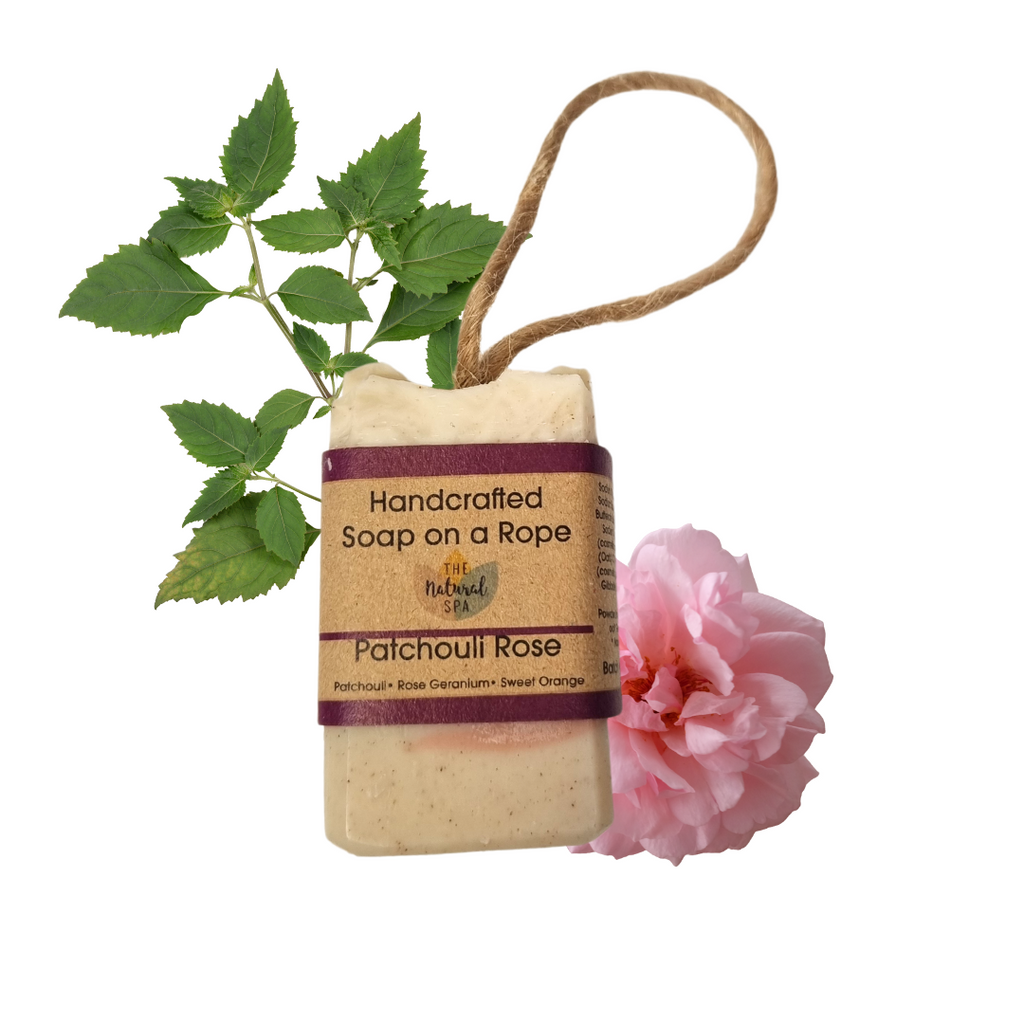 Patchouli and rose natural handcrafted vegan soap bar with rustic botanical texture and clay finish — view 5
