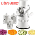 White manual 3-in-1 vegetable slicer and spiralizer with stainless steel drum blades.