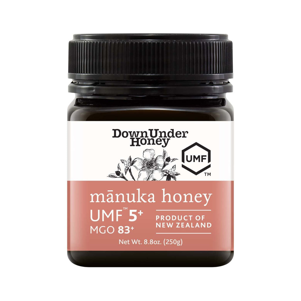 8.8oz jar of pure New Zealand UMF 5+ Manuka honey with a smooth golden creamy texture