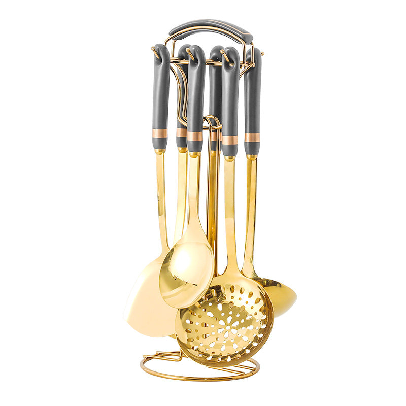 Matte seven-piece kitchen utensil set with stainless steel heads and white ceramic handles — view 3