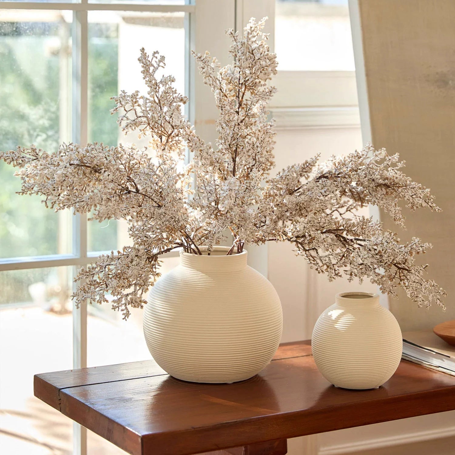 Minimalist ribbed ceramic vase in matte white, elegant unglazed textured centerpiece for modern home decor — view 2