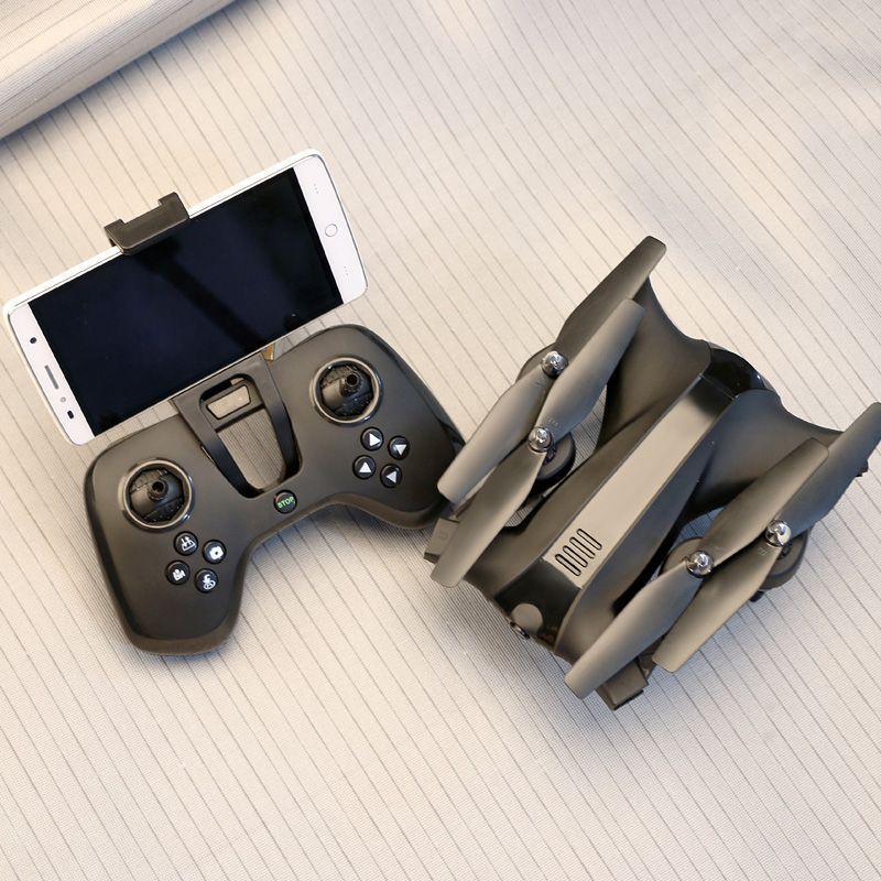 Foldable remote control quadcopter drone with HD camera and four durable propeller blades — view 4