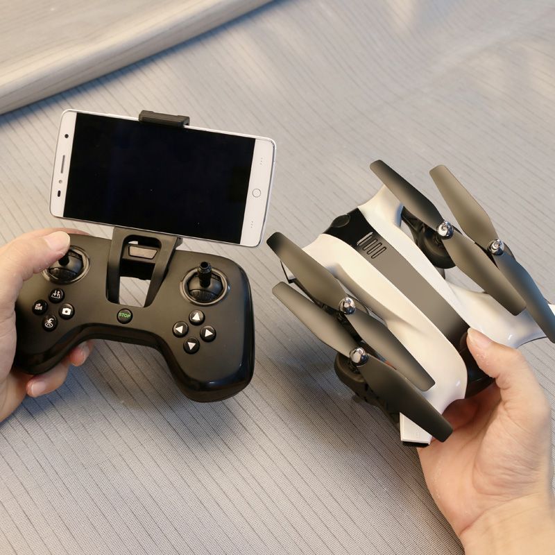 Foldable remote control quadcopter drone with HD camera and four durable propeller blades — view 5