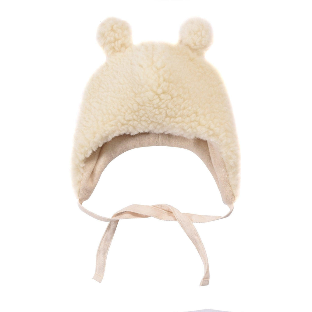 Polar white woolen baby hat with teddy texture, bear ears, and long secure tie strings