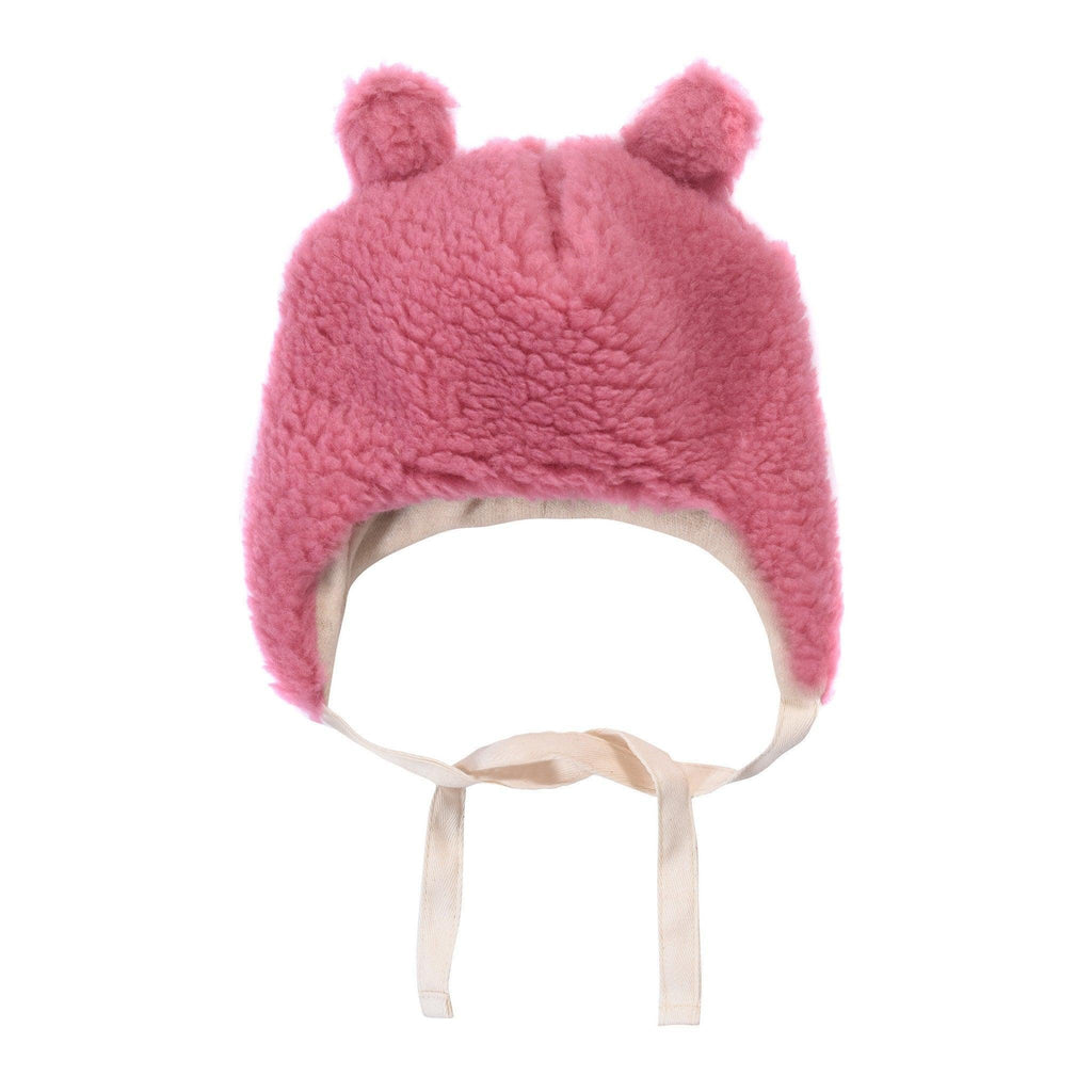 Pink teddy-textured virgin wool baby hat with adorable bear ears and extra-long secure ties.