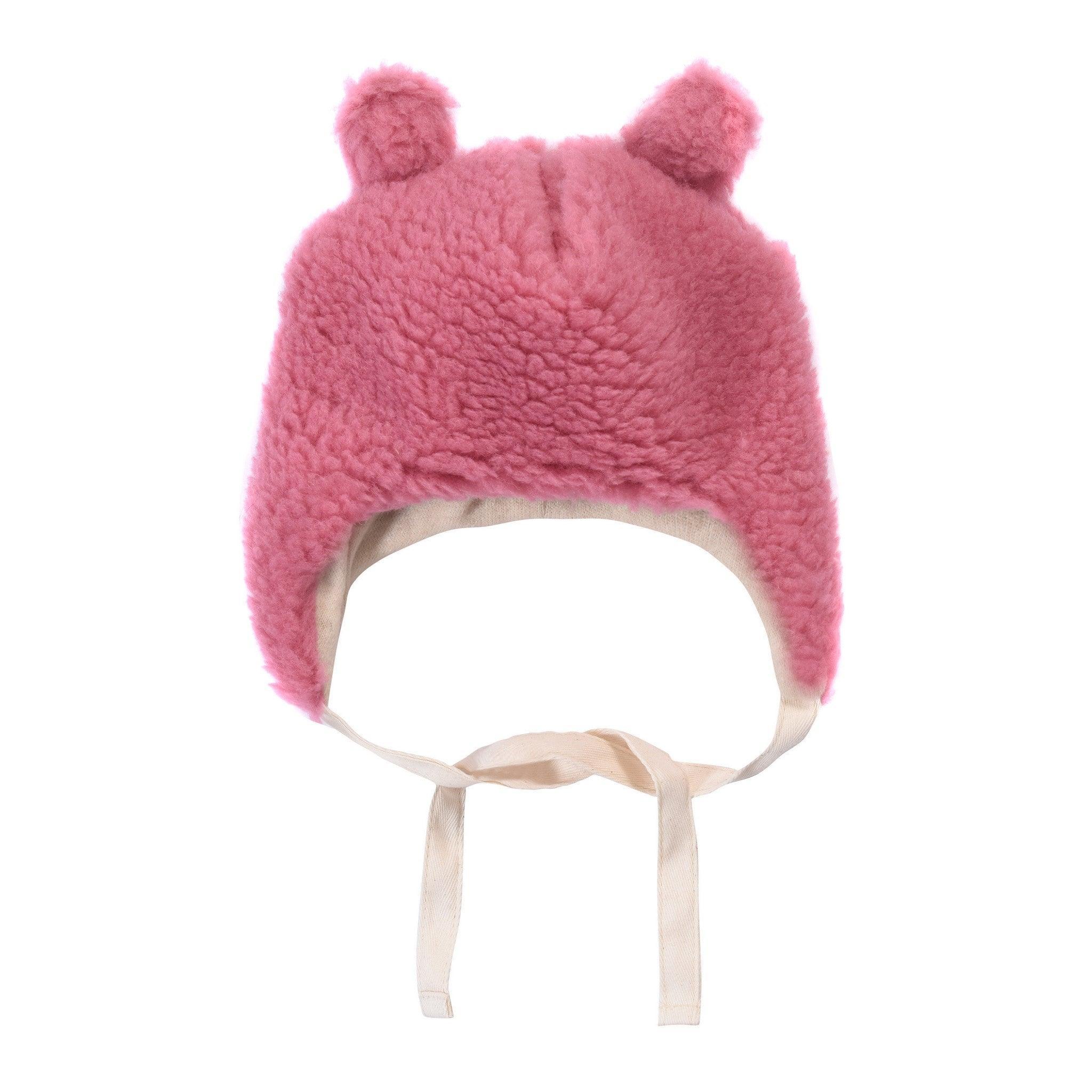 Pink teddy-textured virgin wool baby hat with adorable bear ears and extra-long secure ties.