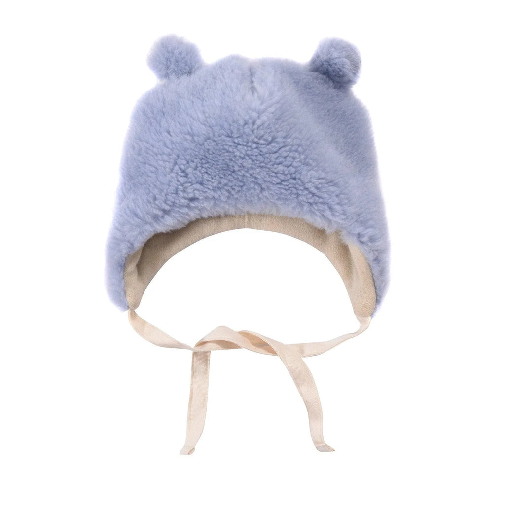 Blue woolen baby hat featuring soft teddy texture playful bear ears and extra long secure ties