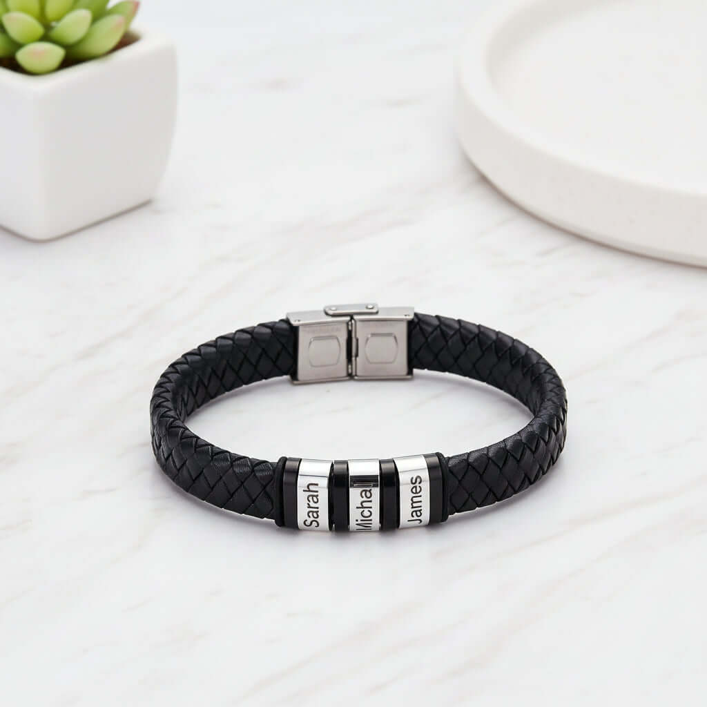 Mens personalized black woven leather bracelet with custom engraved stainless steel name plate