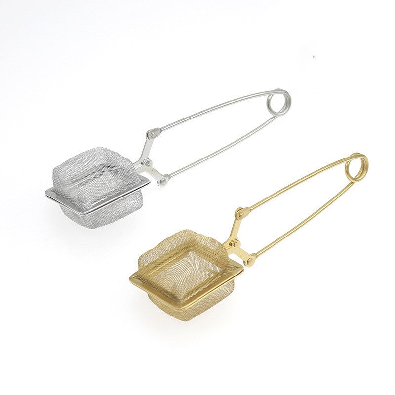 Stainless steel mesh ball tea infuser with handle clip for steeping loose leaf tea in mugs