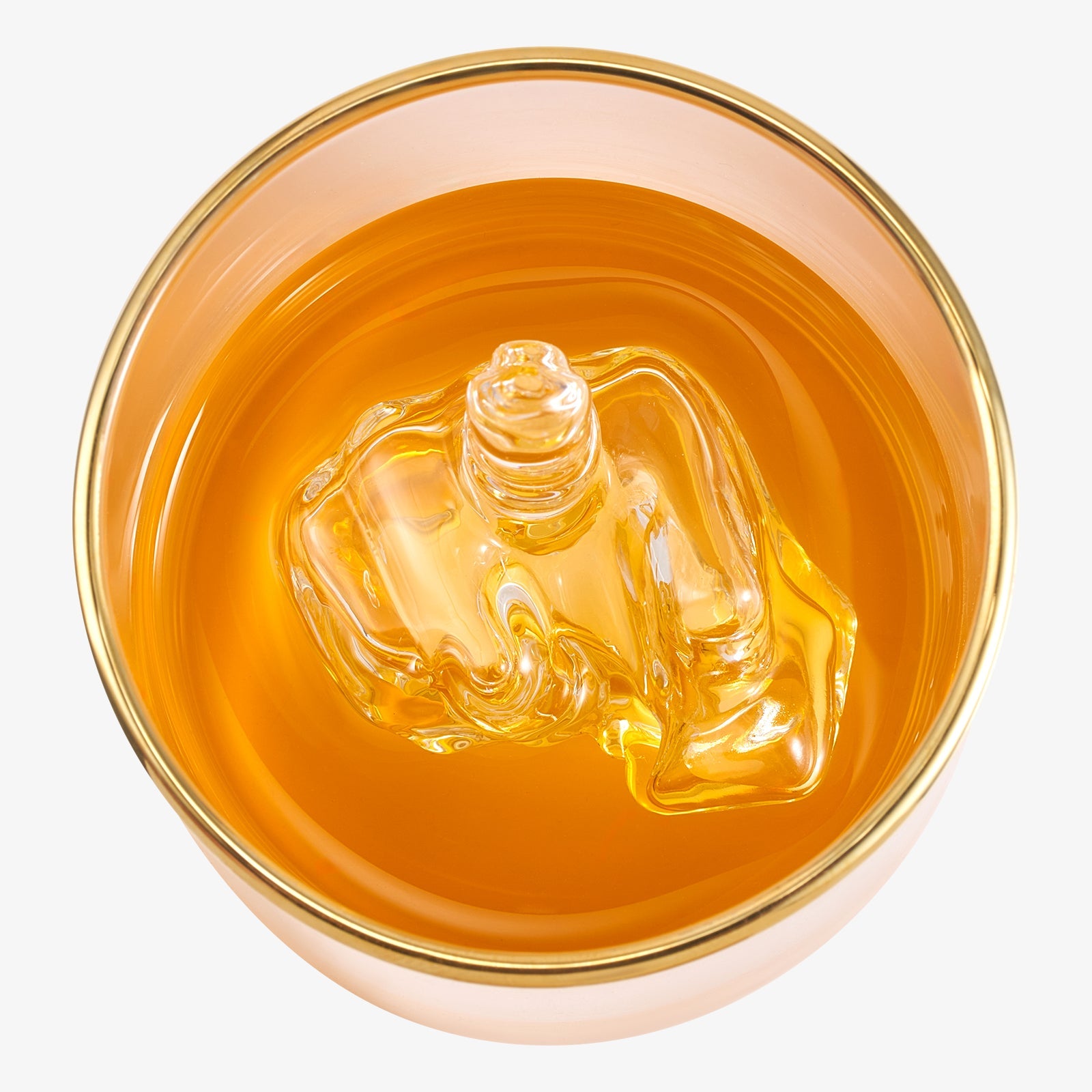 Clear 12.5 oz novelty middle finger whiskey glass sitting on a home bar counter — view 4