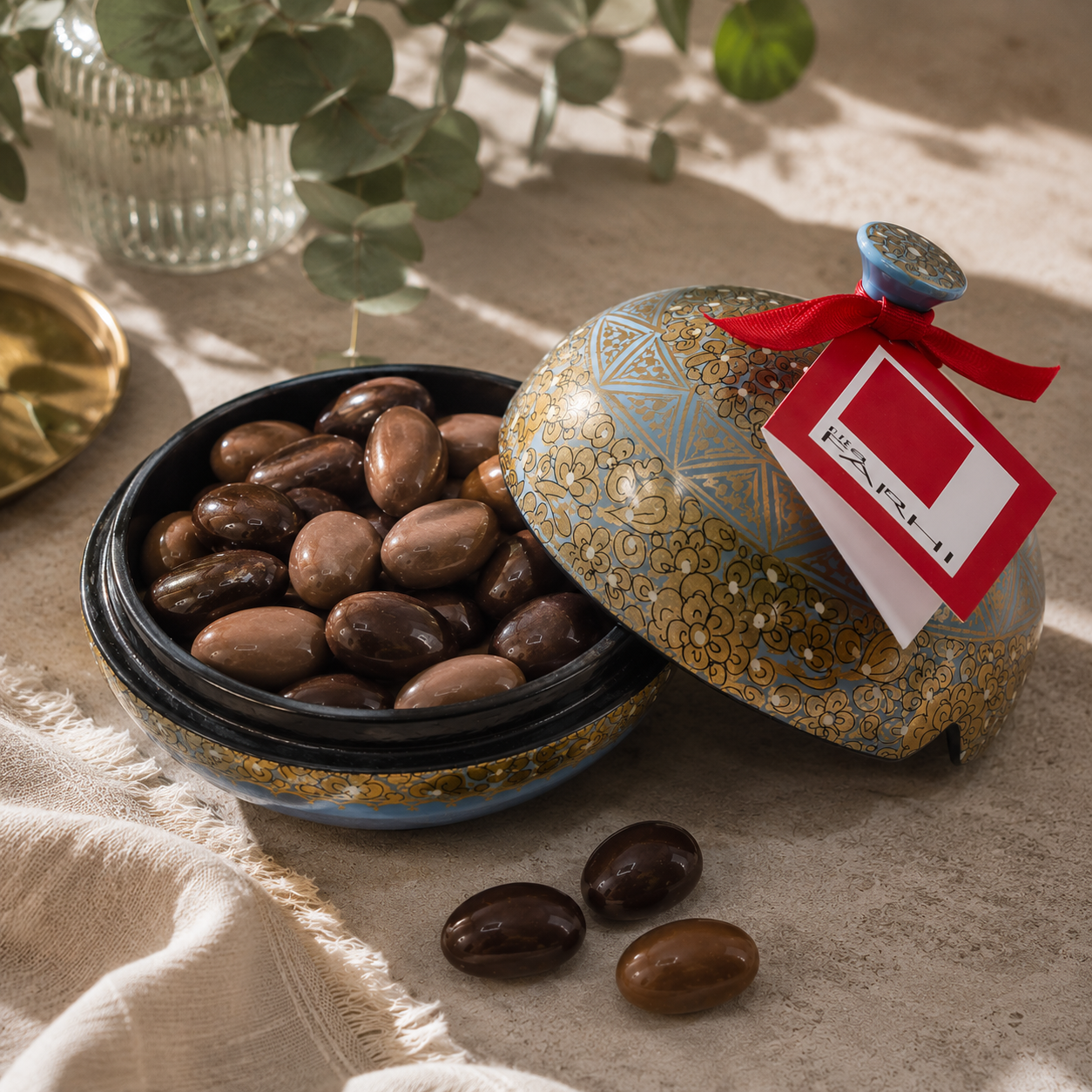 Hand-painted papier-mâché bonbonnière filled with milk and dark chocolate-coated Brazil nuts — view 2