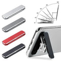Mini folding mobile phone holder in aluminum alloy attached to the back of a smartphone