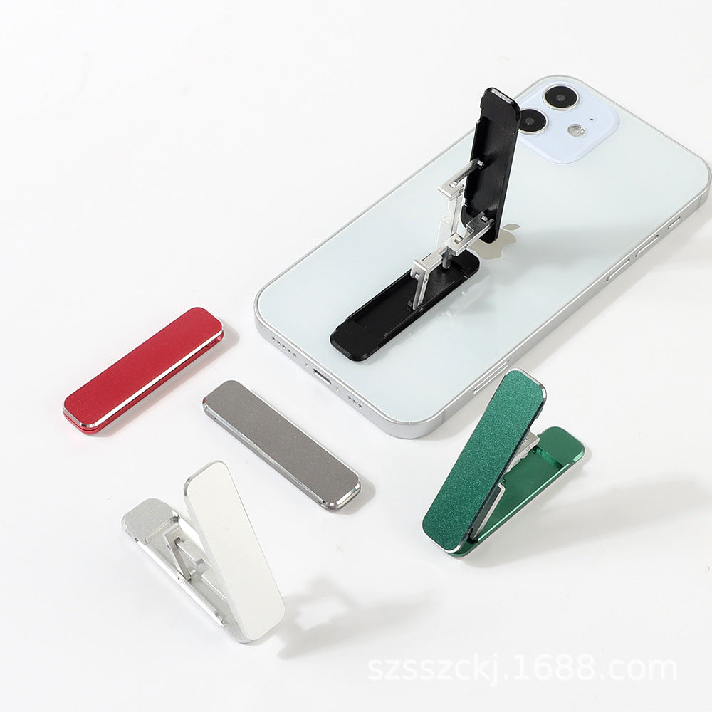 Mini folding mobile phone holder in aluminum alloy attached to the back of a smartphone — view 3
