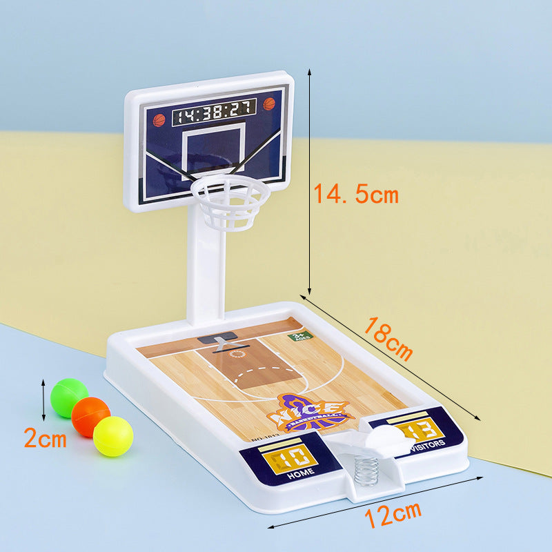 Mini desktop basketball game in blue and white plastic with three small orange balls — view 2