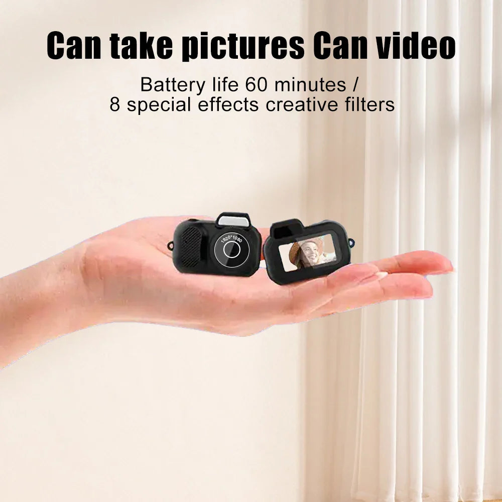 Compact black 1080p HD mini camera with a built-in display screen and small lightweight frame — view 5