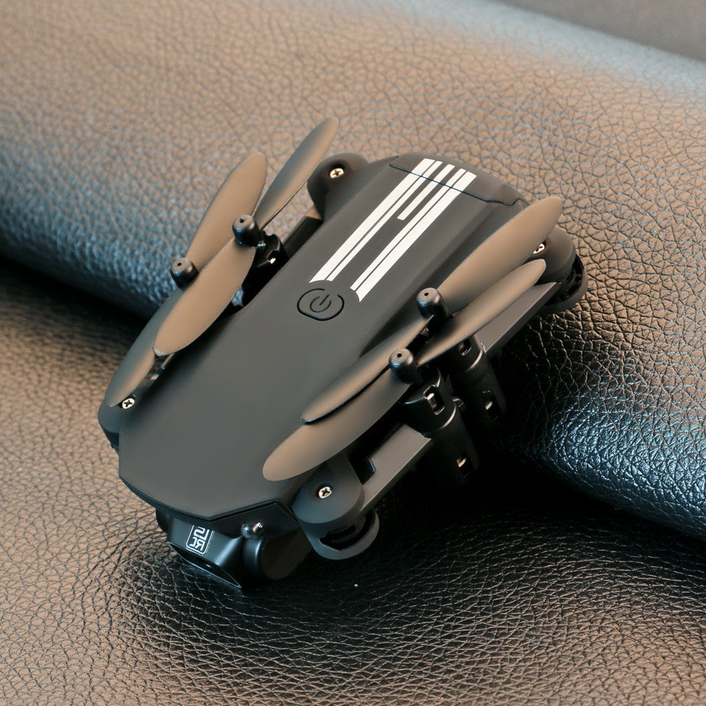 Mini foldable 4K aerial photography drone in sleek modern design with remote controller — view 5